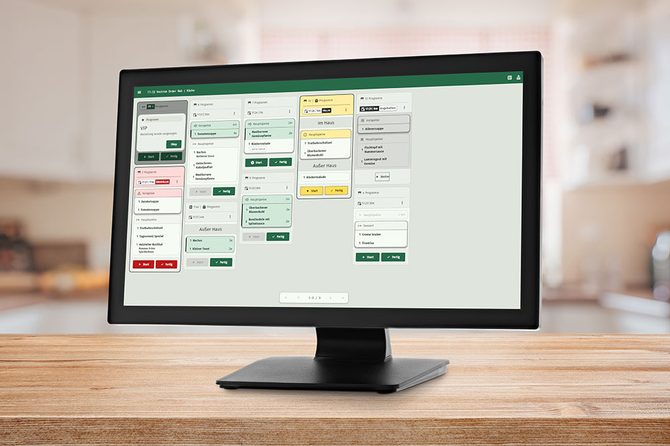 Vectron Order Hub auf einem Monitor mit offenen Bestellungen für Küche und Bar